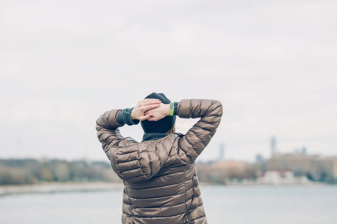 Person with hands on their head feeling stressed